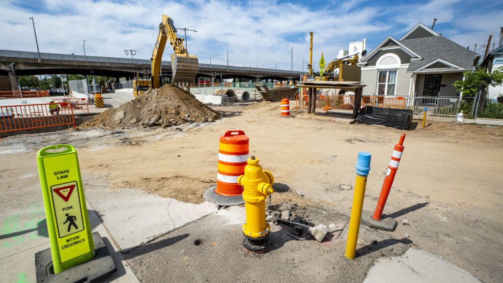 I-70 expansion construction sits just beyond the fence of this home on Columbine Street in Elyria Swansea. July 22, 2020.