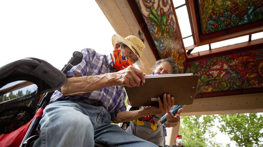100-year-old Victororiano Trujillo walked from his home to sign a petition to change the name of Columbus Park to La Raza Park. July 24, 2020.