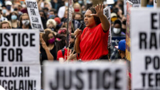 Candice Bailey speaks at a protest at Aurora's municipal complex demanding justice for Elijah McClain. July 25, 2020.