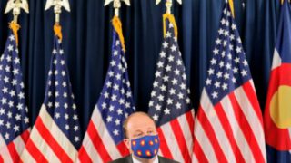 Gov. Jared Polis announces a statewide mask order on July 16, 2020.
