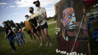 A flower and candlelight vigil for Elijah McClain in Aurora on July 11, 2020