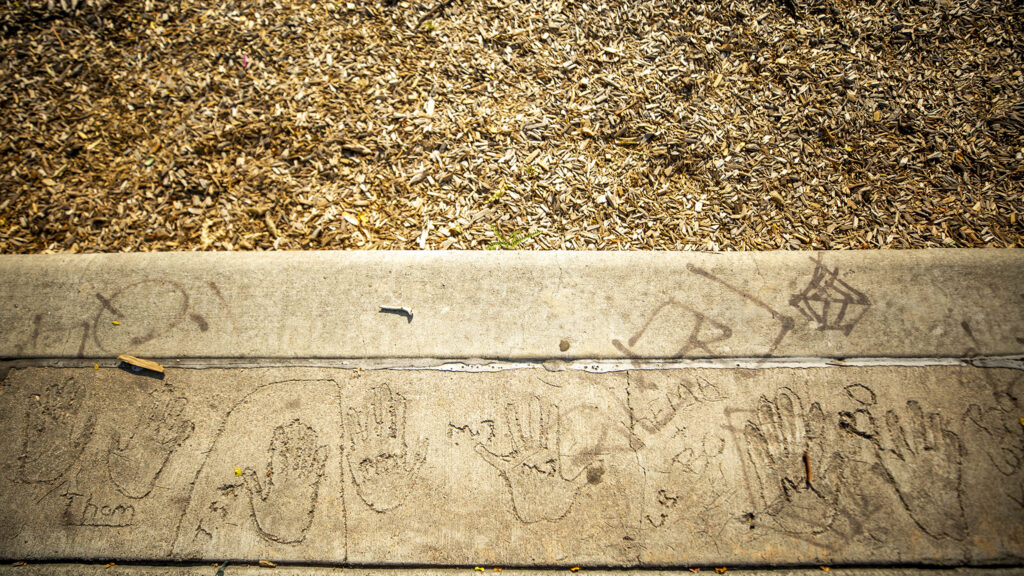 Neighborhood kids traced their hands in wet cement the last time Russell Square Park saw a big improvement project, a new playground that was installed in the '90s. Aug. 13, 2020.