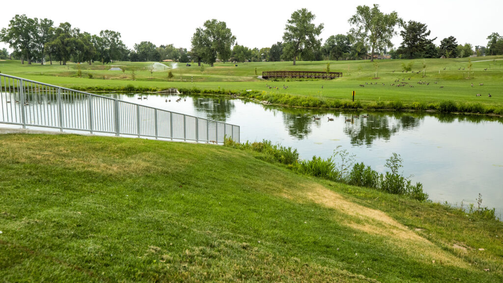 That cart bridge beyond this new detention pond at City Park Golf Course could be covered with water during a 100-year flood event. Aug. 20, 2020.