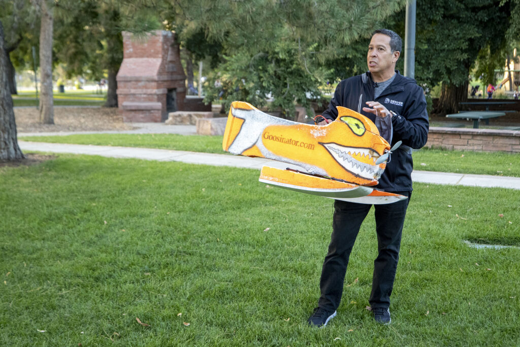 Scott Gilmore, deputy executive director with Denver Parks and Recreation, holds the city's Goosinator, which scares geese, at Washington Park.  September  28, 2020.