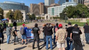 Right-wing protesters and counter-demonstrators faced off, separated by police, in Civic Center Park on October 10, 2020.