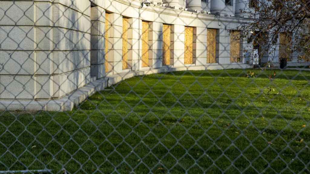 Denver City and County Building is fenced off in preparation for the 2020 election. Oct. 31, 2020.