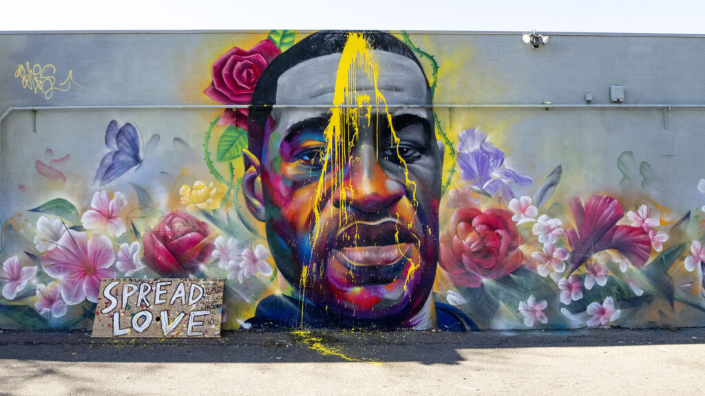 Detour and Heiro's mural of George Floyd, on East Colfax Avenue, was defaced for the second time in a month. Nov. 4, 2020.