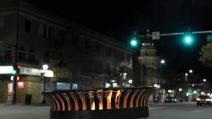 A trash can burns during a protest against police on East Colfax Avenue. Nov. 4, 2020.