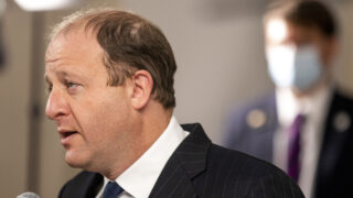 Gov. Jared Polis holds a press conference on COVID-19 at the Governor's Mansion in Capitol Hill. Nov. 17, 2020.