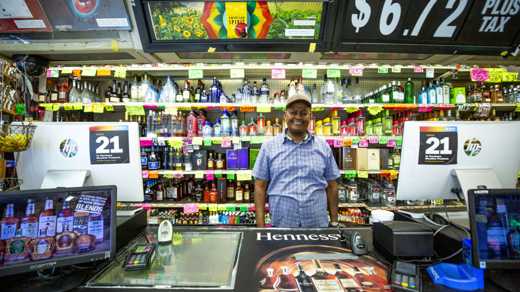 Haile Degena, owner of Royal Drug, stands in his shop at Bruce Randolph Avenue and York Street. July 22, 2020.