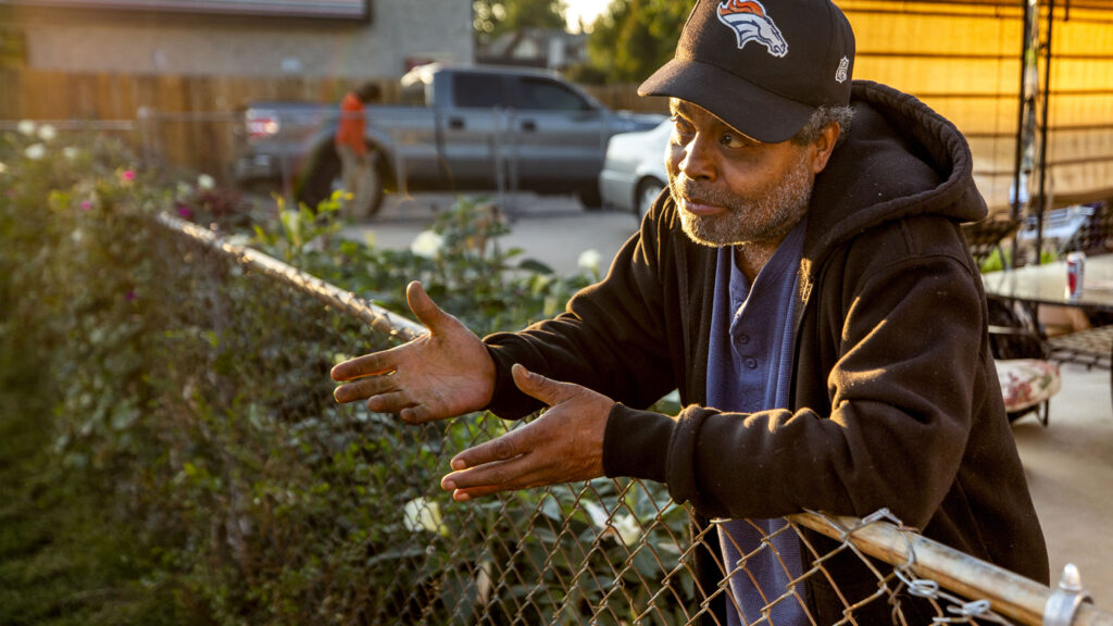 Roderick "Squeaky" Richardson at his longtime home along Bruce Randolph Avenue by York Street. Sept. 11, 2020.
