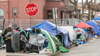 A homeless encampment on Pearl Street and 16th Avenue in Denver, Monday, Dec. 1, 2020.