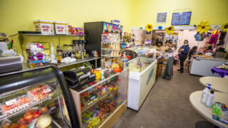 Tanya Baez, owner of Hello Tabby's Ice Cream, inside her shop at Franklin Street and Bruce Randolph Avenue. Dec. 11, 2020.