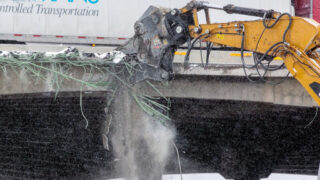 Dust and debris kicked up with the continuing construction of the Central 70 project in Denver adds to air pollution in the Swansea Elyria neighborhood during the coronavirus pandemic. Friday, Dec. 11, 2020.