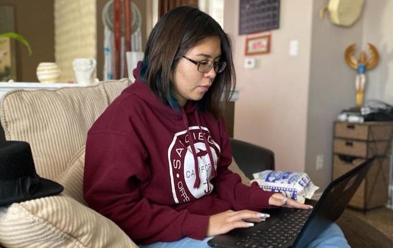 North High School junior Grace Atayde on her laptop. (Courtesy photo)