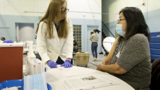 Ava Hamilton was "very excited" to get the first round of the Moderna COVID-19 vaccines at the Denver Indian Center, part of the second wave of prioritized shots in the city. Jan. 8, 2020.