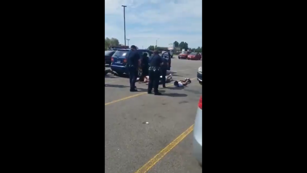 A screenshot from a cellphone video showing the incident between Aurora Police and Brittney Gilliam's family.
