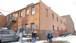 The site of a historic marker in LoDo that details the "Chinese Riot of 1880." Feb. 25, 2021.