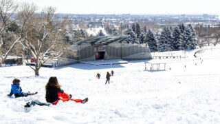 Kids sled the big hill at Ruby Hill in Denver. Feb. 25, 2021.