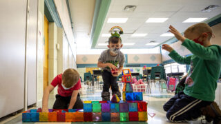 Kindergarteners Hayden (right to left), Mac and Nate build a space station out of magnetic blocks during Carson Elementary's Discovery Link after-school program. March 17, 2021.