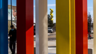 Herbert Bayer's "articulated wall" can be seen through the posts of his "Four Chromatic Gates," which was recently installed at RTD's Alameda Station at South Cherokee Street and West Alaska Place. March 18, 2021.