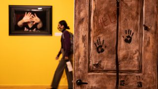 A door detail from “Home Sweet Home” by Manuel Cordero and Tania Valenzuela in the exhibit “SOMOS: On Domestic Violence, Resilience and Healing” at Museo de las Americas in Denver.