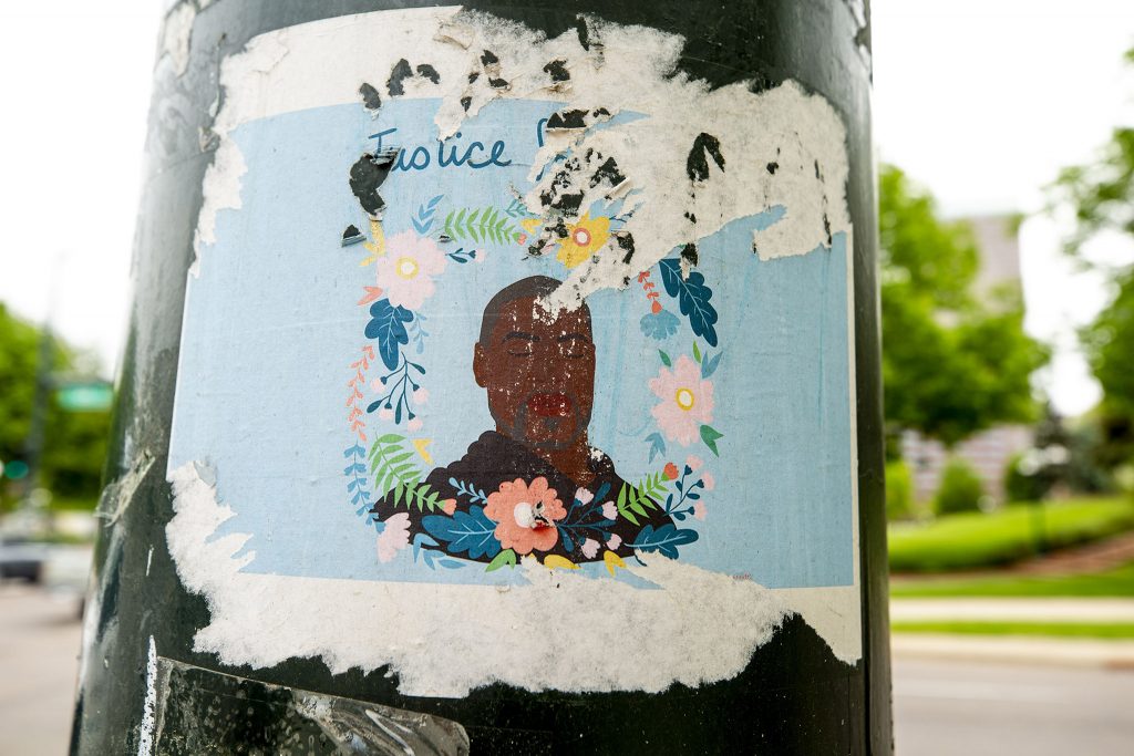 An illustration of George Floyd pasted to a light pole on Broadway by the Colorado State Capitol. May 27, 2021.