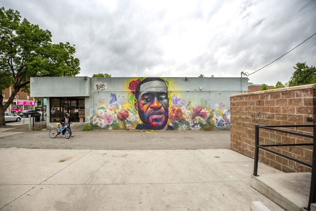 Detour and Hiero's mural of George Floyd painted on a Ready Temporary Services building on Colfax Avenue. May 27, 2021.