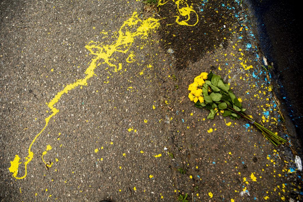 Yellow roses left by Detour and Hiero's mural of George Floyd off East Colfax Avenue. May 27, 2021.