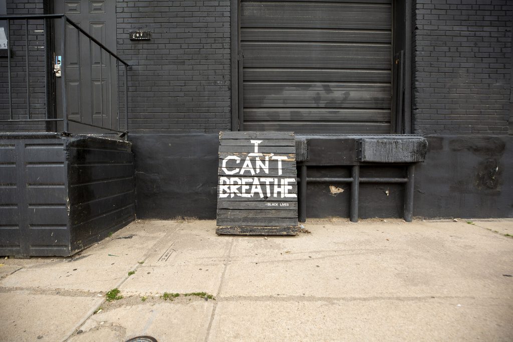 "I CAN'T BREATHE" painted on a sign off Walnut Street in Five Points. May 27, 2021.