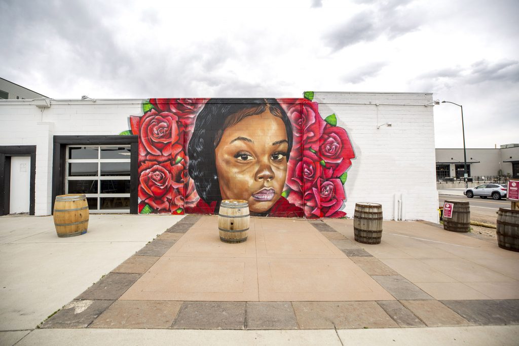 A portrait of Breonna Taylor by Detour and Hiero, painted on the side of the RiNo Co-Op on Walnut Street. May 27, 2021.