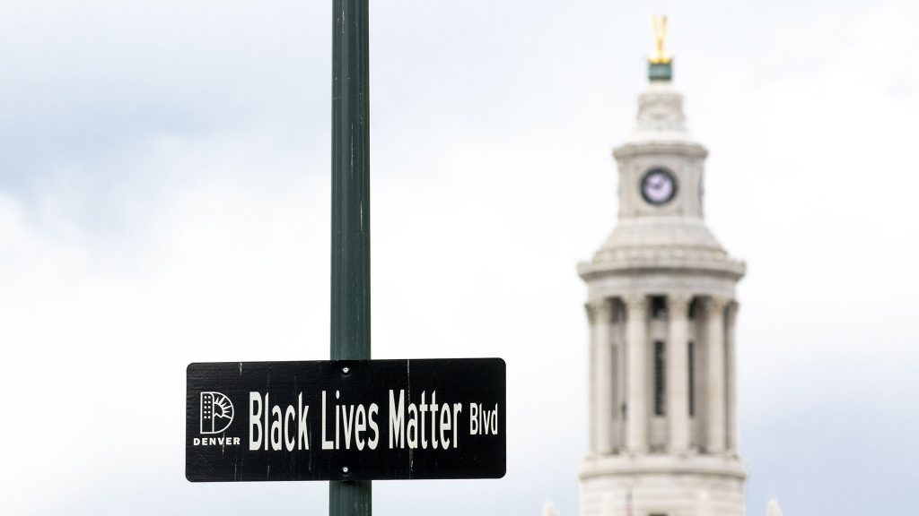 A "Black Lives Matter Blvd" sign posted above Broadway near the State Capitol. May 27, 2021.