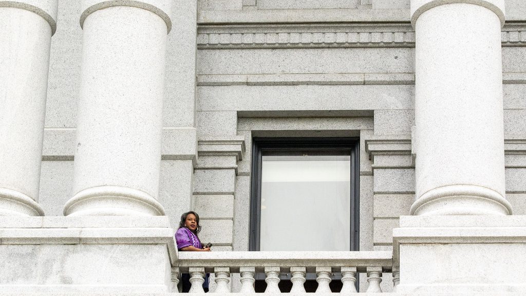 Rep. Leslie Herod stands outside the State House of Representatives chamber at the Capitol. May 27, 2021.