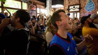 The crowd goes wild for the Denver Nuggets during a playoff watch party at The DNVR Bar on East Colfax Avenue. May 29, 2021.