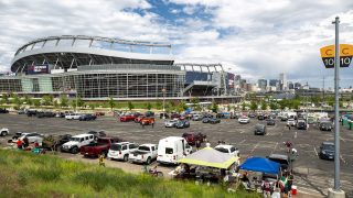 Tailgaters begin to fill the parking lot at Mile High Stadium hours before the U.S. and Mexico national teams face off in the CONCACAF Nations League finals. June 6, 2021.