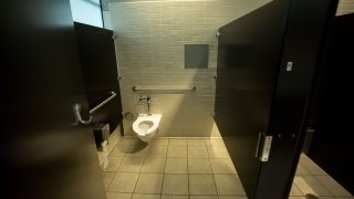 Inside the standard bathroom at the municipal building bearing Wellington Webb's name. June 11, 2021.