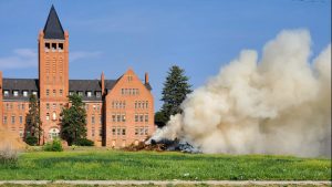 Cut down trees at the Loretto Heights campus in Harvey Park caught fire on June 17, 2021.
