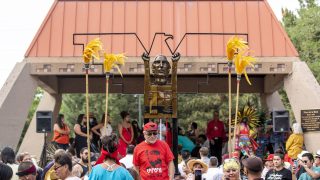 Artist Emanuel Martinez unveils his new sculpture, a tribute to La Raza Park and the city's Chicano activists. Sunnyside, June 20, 2021.