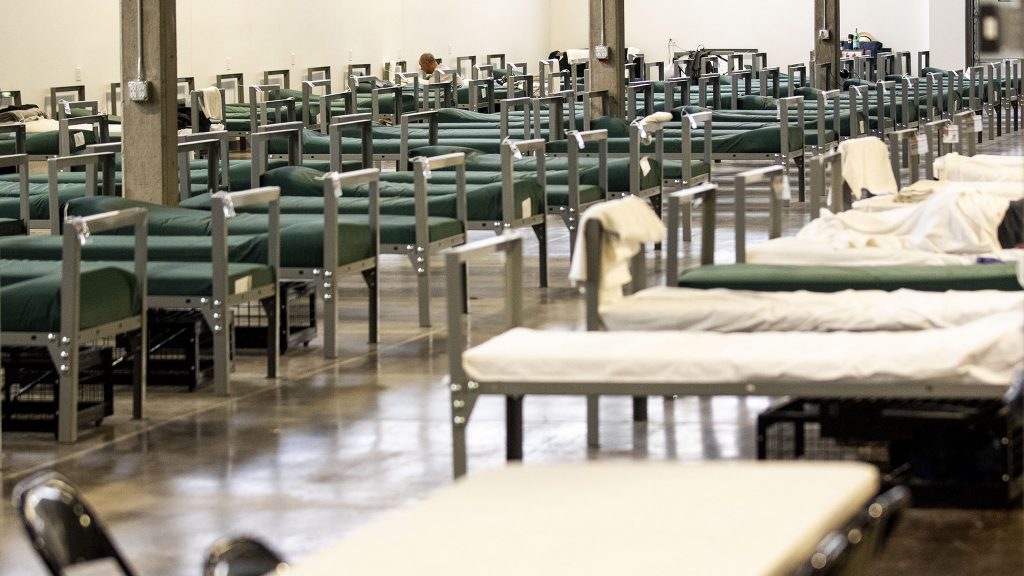 A line of beds inside the Denver Rescue Mission's new shelter in Northeast Park Hill. June 30, 2021.