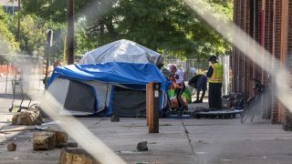 An encampment sweep on California Street in Five Points. July 1, 2021.
