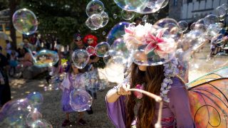 Prumrose the Fairy blows bubbles and the minds of guests walking into the Colorado Renaissance Festival in Larkspur. July 4, 2021.