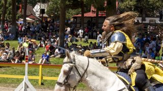 Sir Bruan gallops with a sword during the Colorado Renaissance Festival in Larkspur. July 4, 2021.