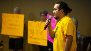 Community actiivst Poncho Espino speaks during a meeting of the National Western Center Citizens Advisory Committee in a NWC conference room in Elyria Swansea. July 22, 2021.