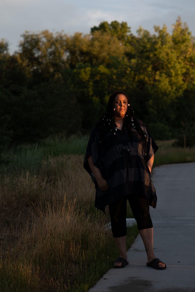 Jennifer Uebelher poses on Thursday, July 1, 2021 at Bear Valley Park in Denver, Colorado.
