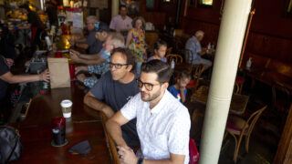 Danny (right) and David Newman hang at the bar at My Brother's Bar. Highland, Aug. 13, 2021.