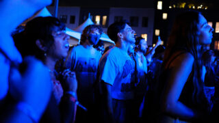 People dance to a song by Shannon and The Clams at the Underground Music Showcase main stage in Denver on Friday, August 27, 2021.