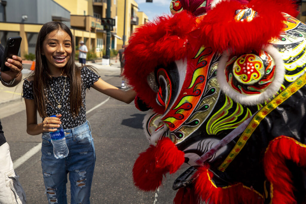 The GDPT Nguyen Thieu line dancers perform a lion dance at the Westwood Chile Fest on Morrison Road. Sept. 11, 2021.