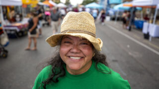 Irma Díaz, of the Mujeres Emprendedoras Cooperative, stands on Morrison Road during the Westwood Chile Fest. Sept. 11, 2021.