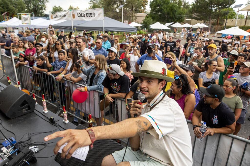 Diego Florez emcees the Westwood Chile Fest's chile eating contest . Sept. 11, 2021.