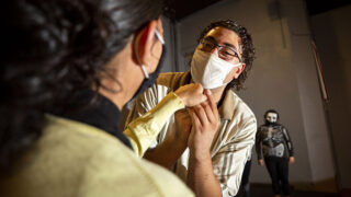Davie Gonzalez and Sierra Fernandez rehearse a scene from "El Corrido del Barrio" at Su Teatro. Sept. 15, 2021.